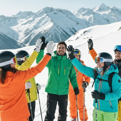 Group of skiers and a guide on a snowy mountain, high-fiving